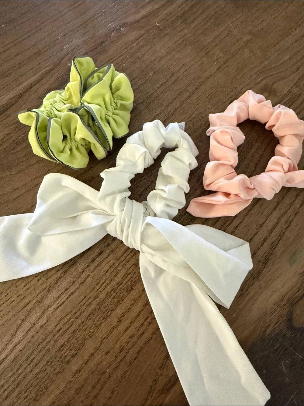 Set of Three Lululemon Scrunchies in Lime, Peach, and White